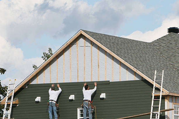 Professional Siding Replacement technician working in Meriden, CT